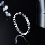 Sleek Round Moissanite Wedding Band