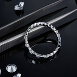 Sleek Round Moissanite Wedding Band